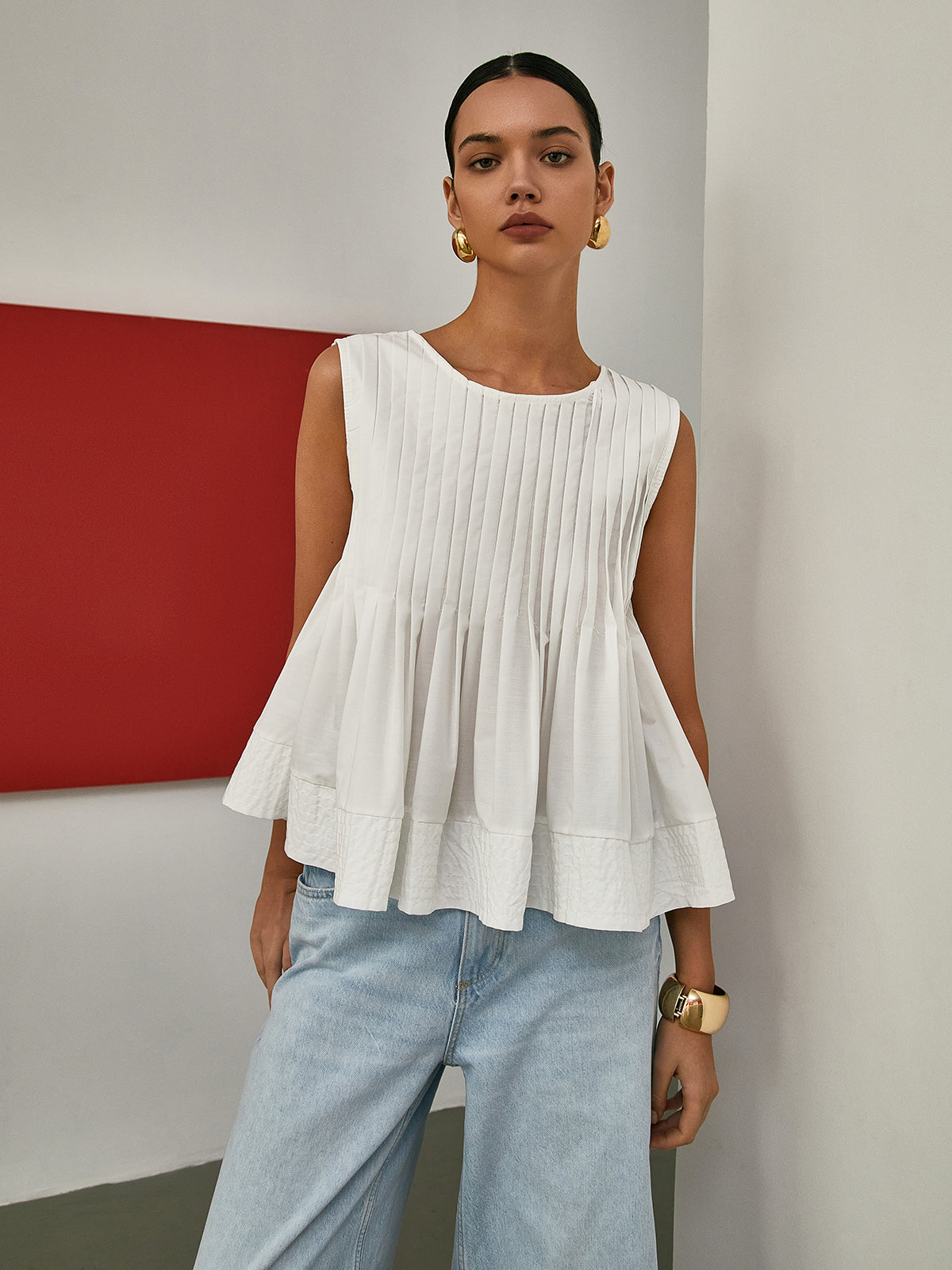 Pleated Peplum Sleeveless Blouse